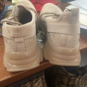 Size 11 but fitsize  10 embellished sneakers.